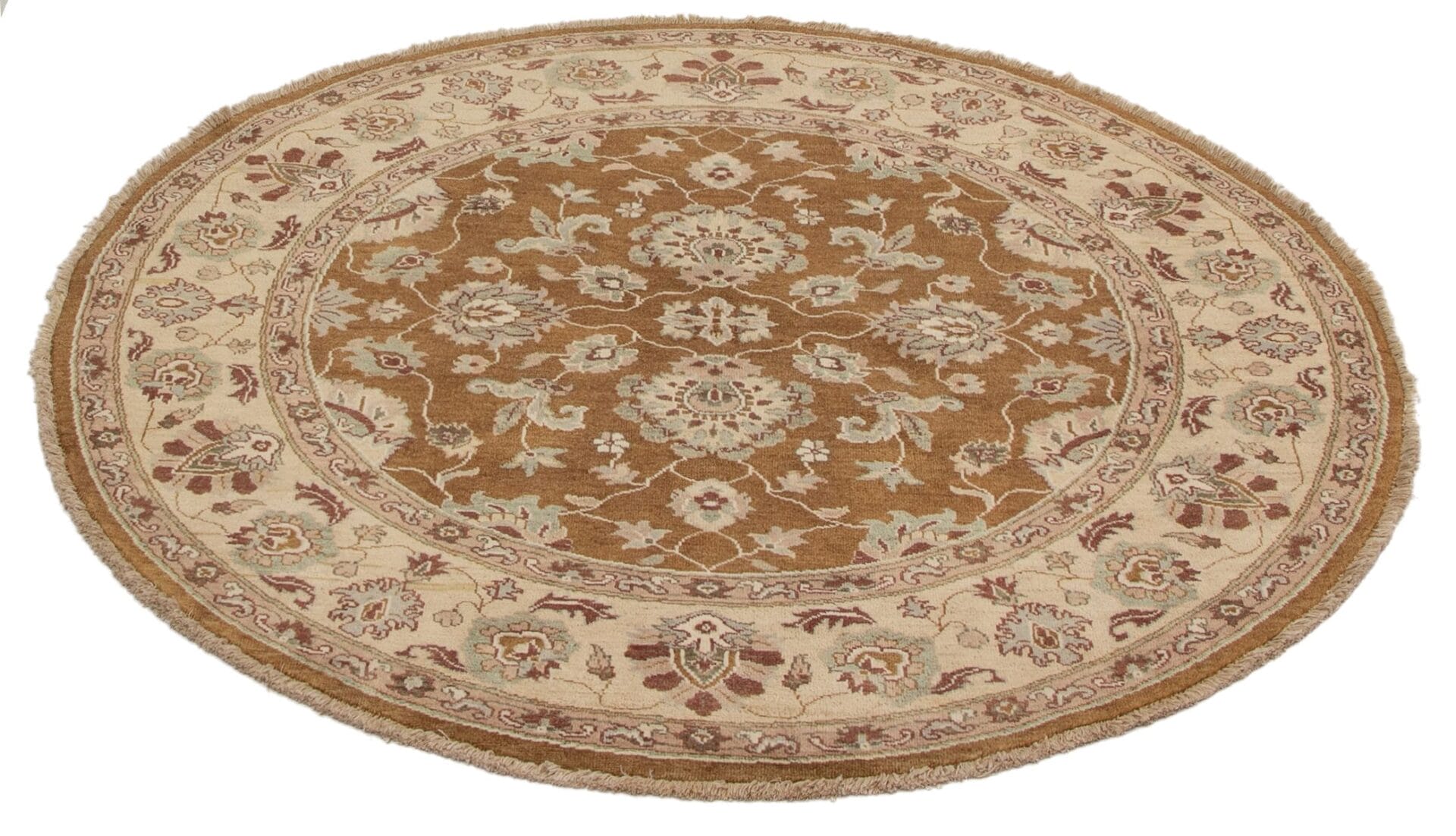 Een rond vloerkleed met een beige en beige bloemdessin.