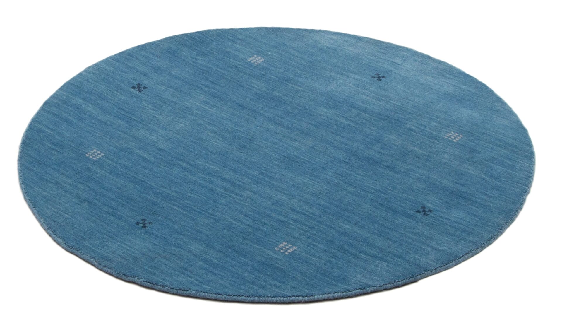 Beschrijving: Een blauw tapijt met een cirkel in het midden.