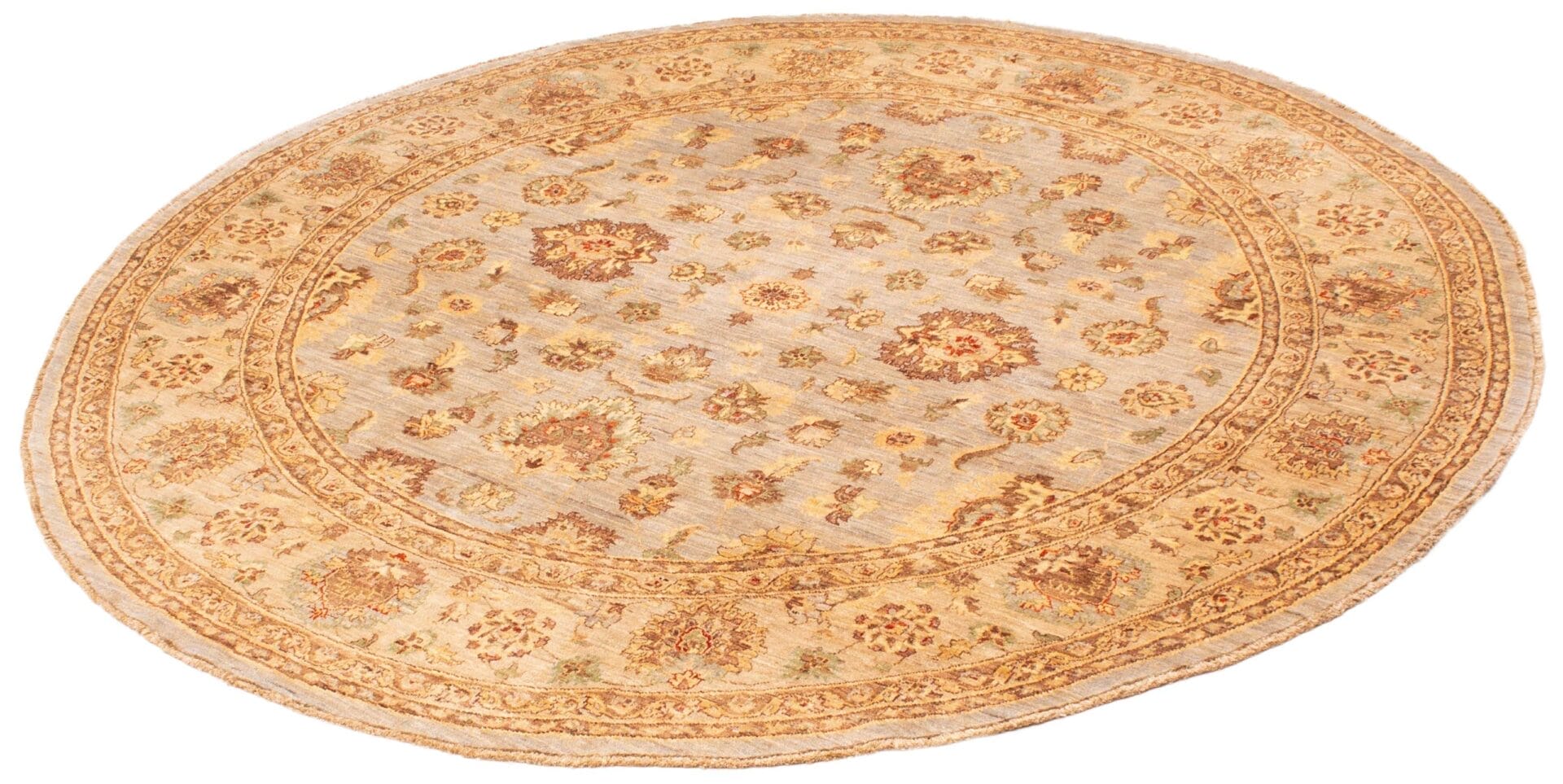 Een beige en bruin rond vloerkleed met bloemmotieven.