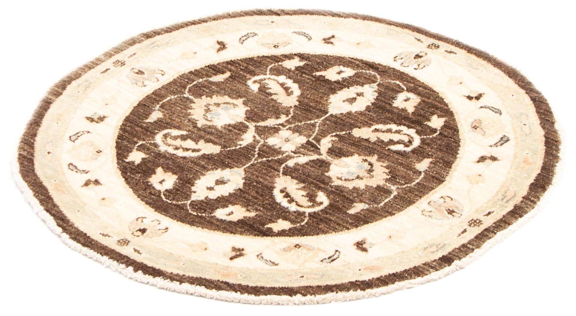 Een vloerkleed beige rond vloerkleed met een bloemmotief.