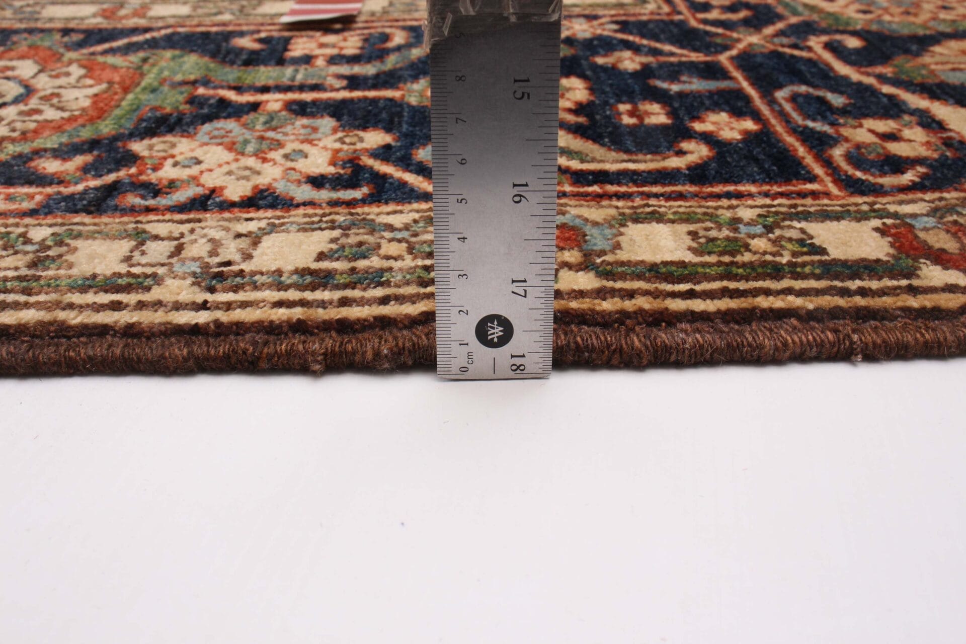 Een vloerkleed wordt gebruikt om de maat van een vloerkleed te meten.