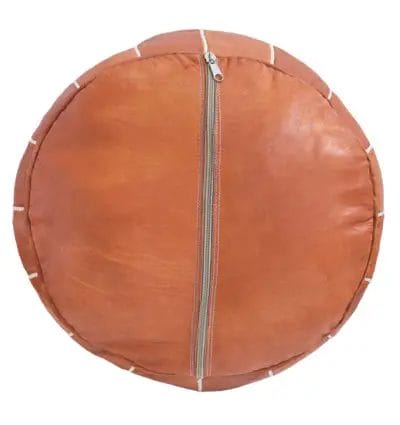 Round, brown leather pouf with a zipper in the middle, viewed from above.